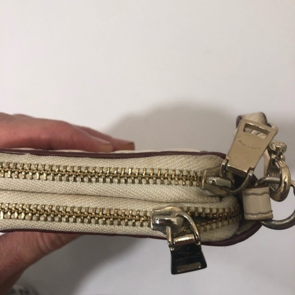 Coach debossed creamy white double zipper wristlet
